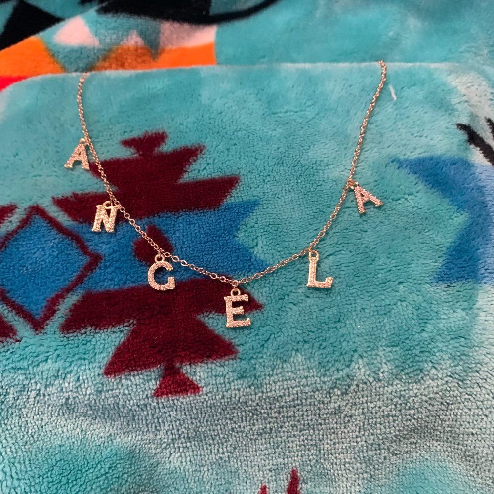 Brand NEW "Angela" Gold Colored Necklace with fake diamonds